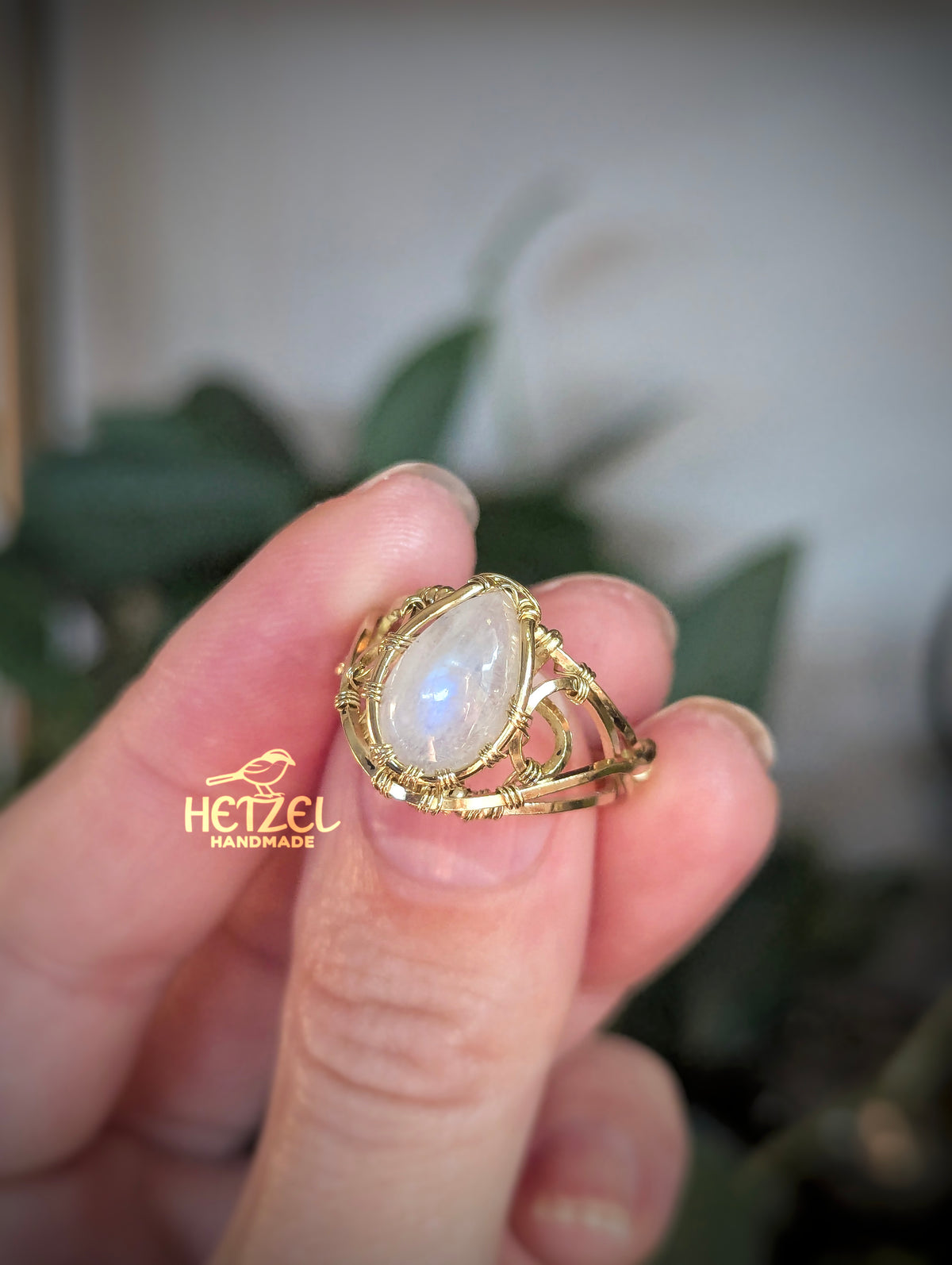 Hollow Bloom – Rainbow Moonstone Bright Brass Wire Wrapped Ring